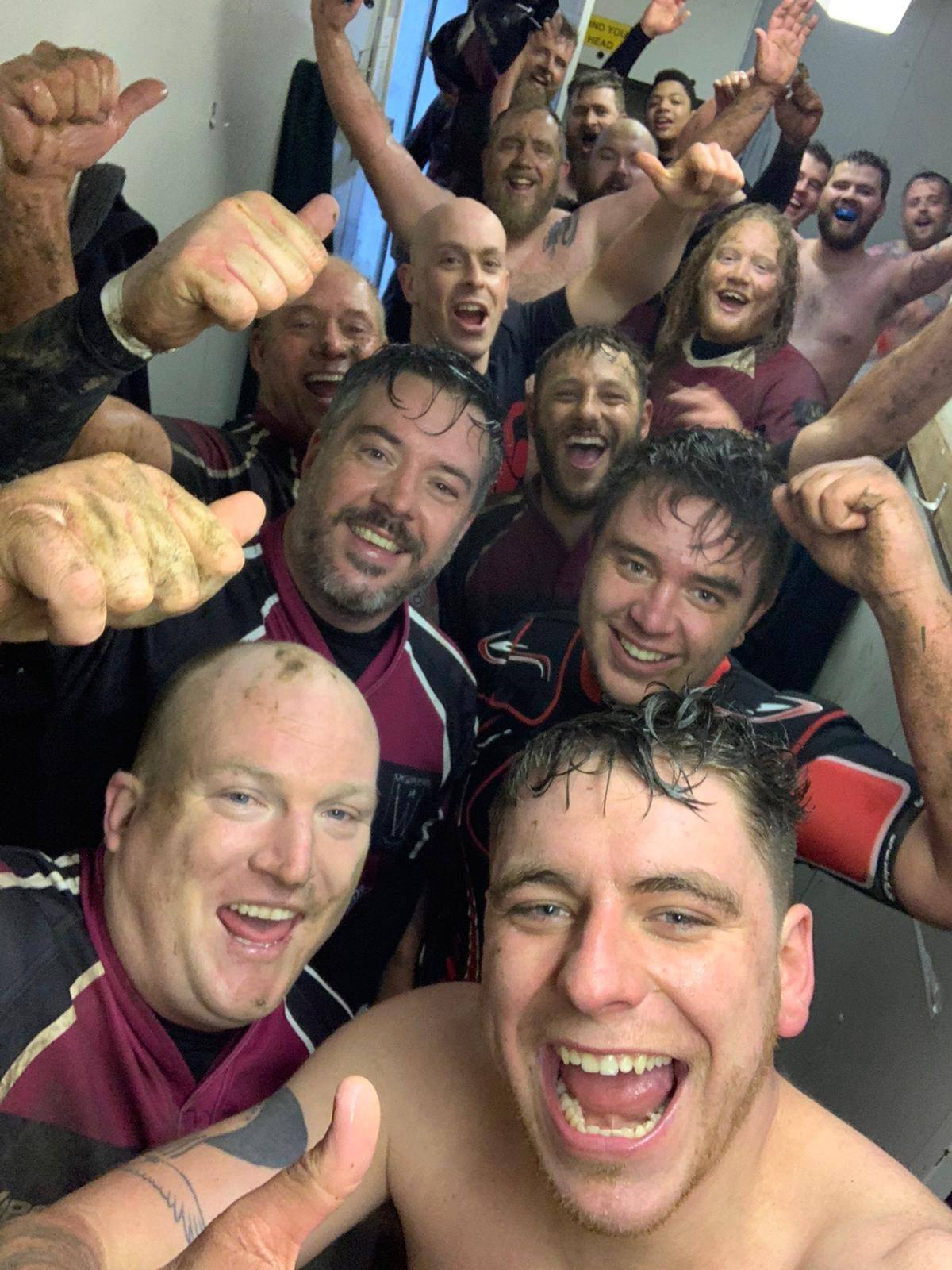 Players celebrating together after a match